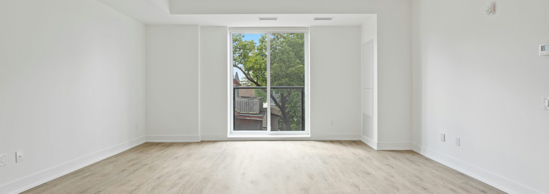 white wooden framed glass door